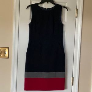 Navy blue sleeveless dress.